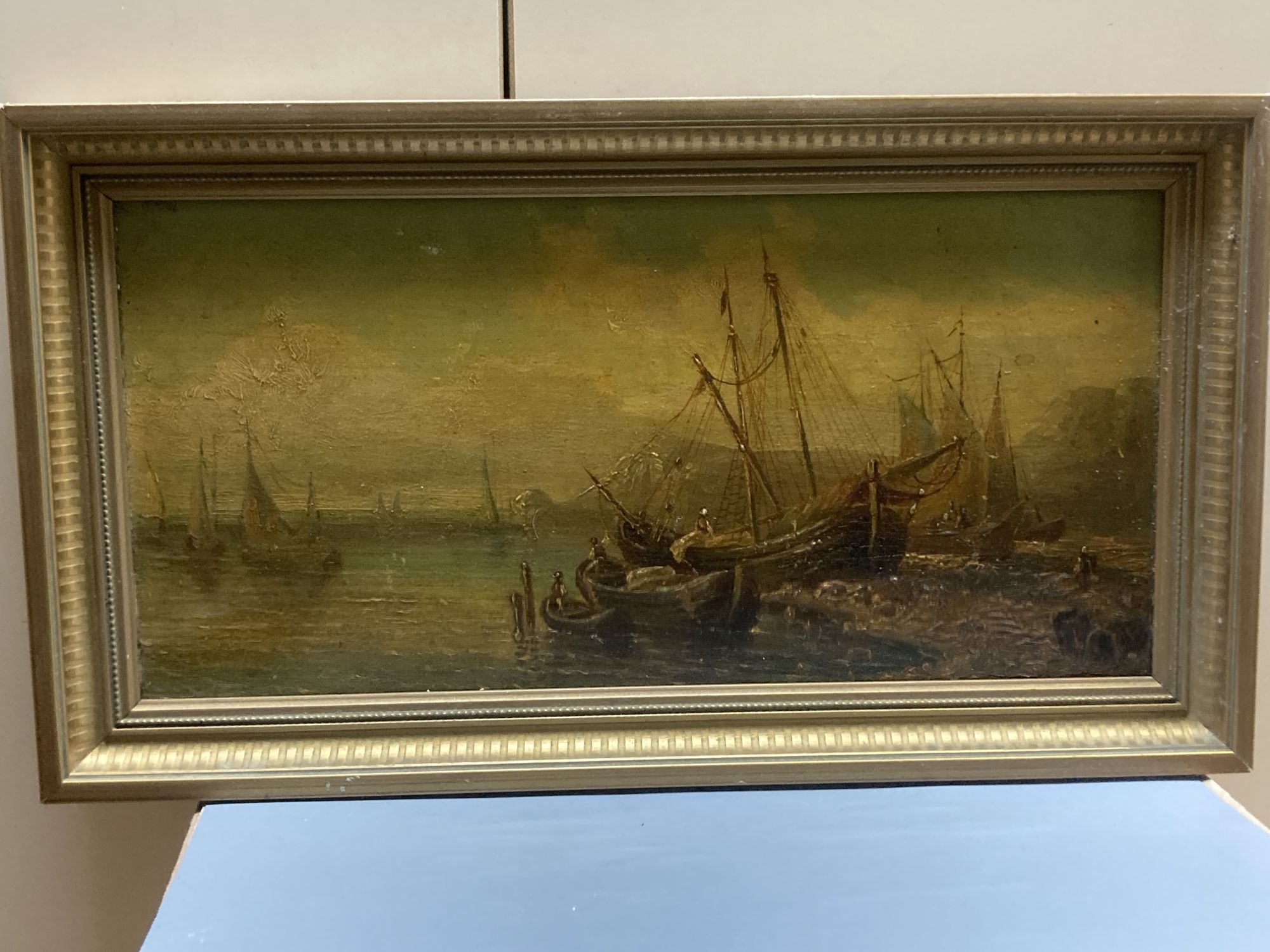 Italian School, oil on panel, Fishing boats at anchor, indistinctly signed, 15 x 30cm